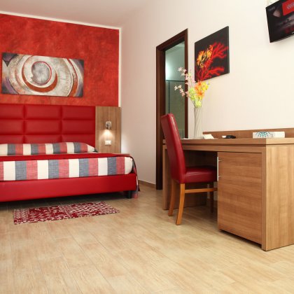 Camera SUPERIOR QUADRUPLA con patio